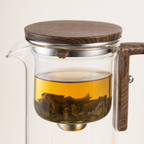 Walnut lid and infuser chamber of the Magnetic Release Teapot