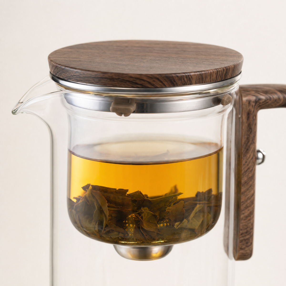 Walnut lid and infuser chamber of the Magnetic Release Teapot